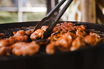 Close-up of meat on barbecue grill