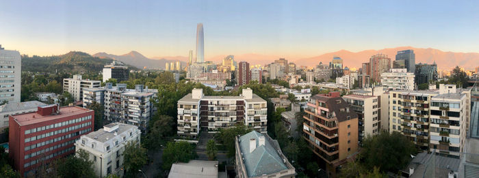 High angle view of buildings in city against sky