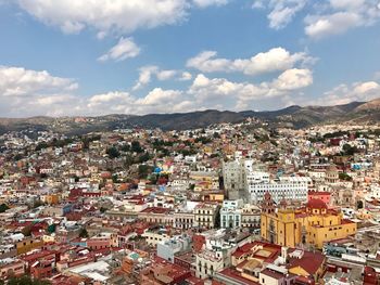 High angle shot of townscape against sky