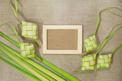 High angle view of vegetables on table against wall