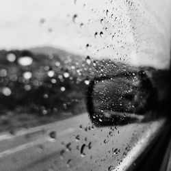 Close-up of wet car window