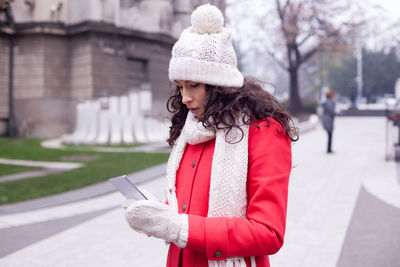 Close-up of young woman in snow