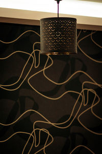 High angle view of illuminated lighting equipment on wall