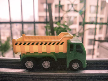 Close-up of toy car on road