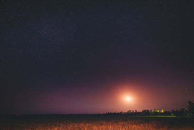 Scenic view of sea against sky at night