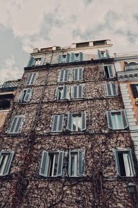 Low angle view of old building against sky