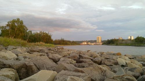 View of calm sea against cloudy sky