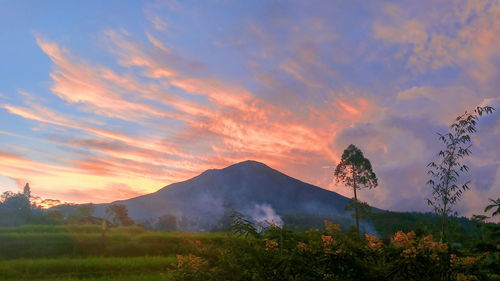 Scenic view of mountains against sky during sunset