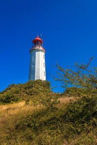 Low angle view of lighthouse against clear sky