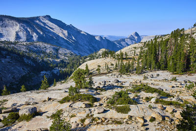 Scenic view of snowcapped mountains against clear sky