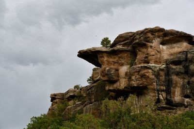 Low angle view of statue against sky