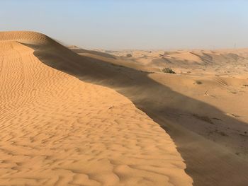 Scenic view of desert against sky