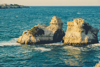 Scenic view of sea against blue sky