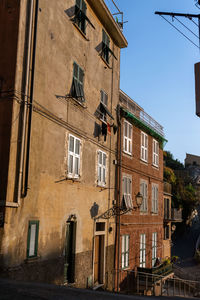 Exterior of building in town against sky