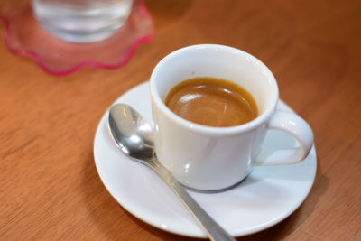 Close-up of coffee cup on table