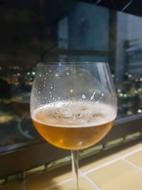 Close-up of beer glass on table