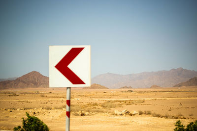 Scenic view of desert against clear sky