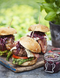 Homemade burgers on table