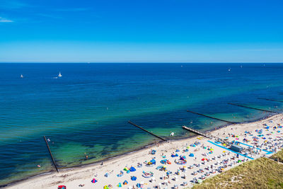 High angle view of swimming pool by sea against sky