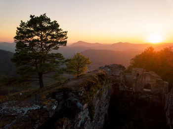 Scenic view of mountains against sky during sunset