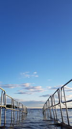 Footbridge over calm river