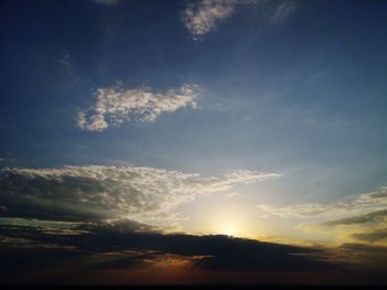 Low angle view of dramatic sky during sunset