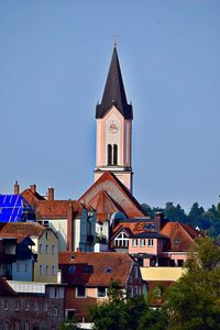 Clock tower against blue sky