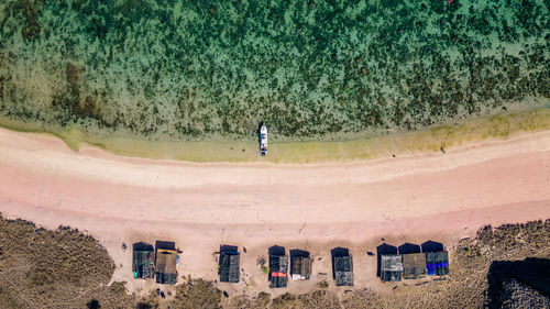 High angle view of people walking on road