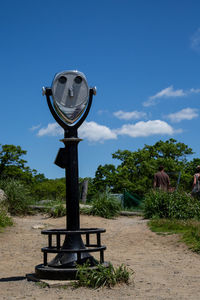 Built structure on field against sky