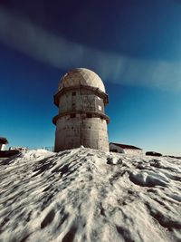 Low angle view of lighthouse against sky