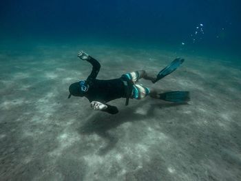 Man swimming in sea