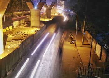 Illuminated railroad station at night