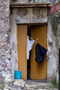 Clothes drying on wall of building