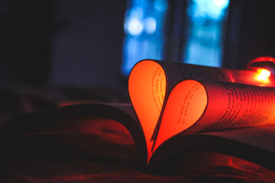 Close-up of heart shape on book