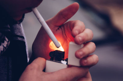 Close-up of person holding hands