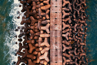 Aerial view of groynes in sea