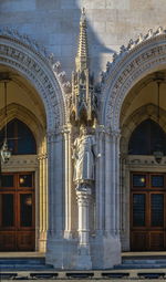 Parliament building on the embankment of budapest, hungary, on a sunny summer morning