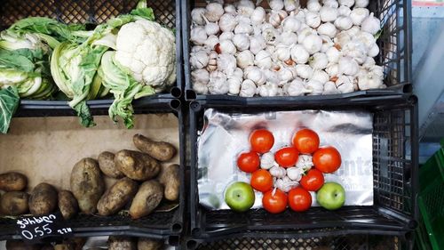 Various vegetables in container at market stall