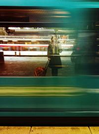 Illuminated railroad station platform