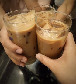 Midsection of woman holding drink