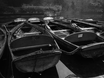 Boats moored at harbor