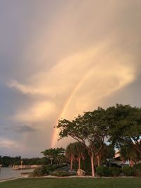 Scenic view of rainbow against sky during sunset