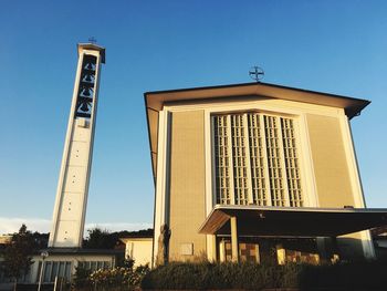 Low angle view of built structure against blue sky