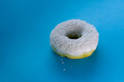 High angle view of ice cream against blue background