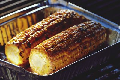 Close-up of corn on the cob in plate