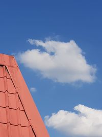 Low angle view of building against blue sky