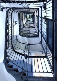 Low angle view of spiral staircase in building