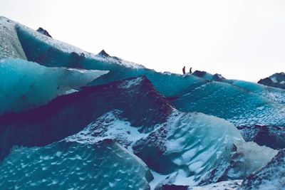 Scenic view of frozen sea against sky