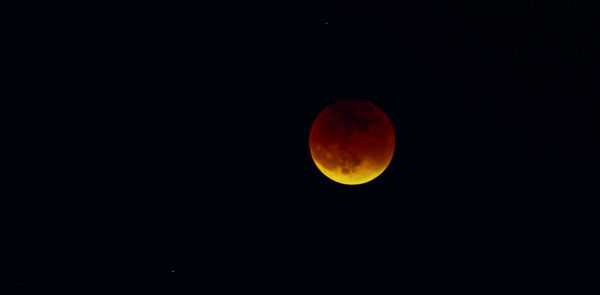 Scenic view of moon against sky at night