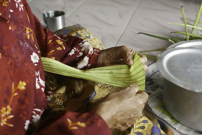 High angle view of woman preparing food